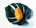 A kiwano fruit on a tropical leaf Royalty Free Stock Photo