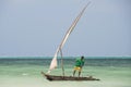 Fisherman on traditional wooden dhow boat, Zanzibar