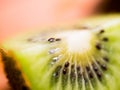 Cut into pieces kiwi macro. Kiwi, cut into slices Royalty Free Stock Photo