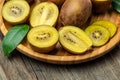 Kiwi fruit close up of fresh and juicy yellow kiwifruit sliced. Food background. Close up Royalty Free Stock Photo