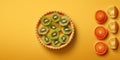 Kiwi fruit slice topping pie tart mud cake crackers blurred background Royalty Free Stock Photo