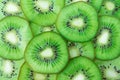 Kiwi fruit slices pattern top view. Fresh juicy food background. Macro Royalty Free Stock Photo