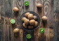Kiwi fruit on wooden background, flat lay. Royalty Free Stock Photo