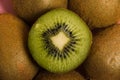 Kiwi macro, whole kiwi and fruit cut in half close-up