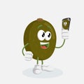 Kiwi mascot and background with selfie pose Royalty Free Stock Photo