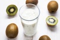 Kiwi milkshake in a glass and some fruits Royalty Free Stock Photo