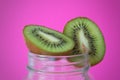 Kiwi with pink background Royalty Free Stock Photo