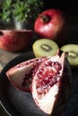 Kiwi and pomegranate. Fruits source of vitamin C. Perfect snack or snack for any time Royalty Free Stock Photo