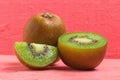 kiwi. sliced. half. fresh. fruit on old wood pink Royalty Free Stock Photo