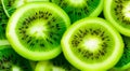 Kiwi slices background or banner. Kiwi fruit cut texture. Flat lay, top view Royalty Free Stock Photo