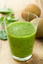 Kiwi spinach green smoothie in glass Royalty Free Stock Photo