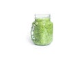 Kiwi and spinach smoothie isolated on a white background. Mason jar with green smoothie. Royalty Free Stock Photo