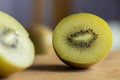 Kiwi split in half, representing half, split or separation. Concept of being separated. A