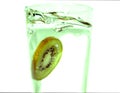 Kiwi slice splash Royalty Free Stock Photo