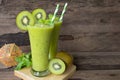 Kiwi yogurt fruit juice smoothie green colorful fruit juice milkshake . Royalty Free Stock Photo