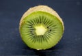 Kiwifruit on a black background