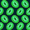 Kiwifruit cut half slices, green neon color palette on dark blue background