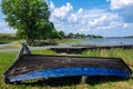 Kizhi, Karelia, Russia - July, 2021: Wooden boat on the shore of Lake Onega on the Kizhi island Royalty Free Stock Photo