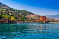 Kizil Kule tower in Alanya peninsula, Antalya district, Turkey, Asia. Famous tourist destination with high mountains. Part of Royalty Free Stock Photo