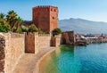Kizil Kule tower in Alanya peninsula, Antalya district, Turkey, Asia. Famous tourist destination with high mountains. Part of Royalty Free Stock Photo