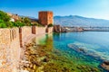 Kizil Kule tower in Alanya peninsula, Antalya district, Turkey, Asia. Famous tourist destination with high mountains. Part of Royalty Free Stock Photo