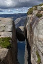 The famous boulder Kjeragbolten that is wedged in a mountain crevasse, Norway