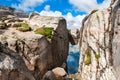 Kjeragbolten - famous landmark on Kjerag mountain, Norway.