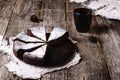 Kladdkaka. Traditional Swedish moist chocolate cake on old rustic wooden table Royalty Free Stock Photo