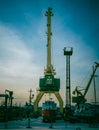 Klaipeda, Lithuania - december 28 2021: Old cargo crane standing in Klaipeda port.