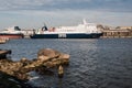 KLAIPEDA, LITHUANIA - November 24, 2019: Sea gate of Klaipeda harbour. The DFDS ferry ship comming to the harbour of Klaipeda Royalty Free Stock Photo