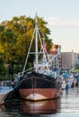 Klaipeda, Lithuania - september 19 2021: The old ship is moored at the quay on the Dane River Royalty Free Stock Photo