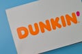 Klang, Malaysia: April 25, 2022- Dunkin` Donuts paper box isolated on a blue background