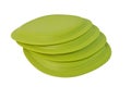 Bunch of green plates over white background. Tupperware brand Royalty Free Stock Photo