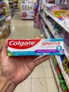 Klang, Malaysia: March 27th, 2025 - Colgate Sensitive Pro-Relief Toothpaste Held in Hand at Supermarket Royalty Free Stock Photo