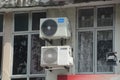 Klang, Malaysia: November 1st, 2023: Two air conditioners are positioned outside the building, alongside a ventilator system Royalty Free Stock Photo