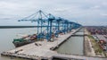 Klang, Malaysia - October 09, 2022: Cranes at the port Klang near Kuala Lumpur. Container crane at Klang Harbor. Aerial view on a