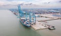 Klang, Malaysia - September 25, 2022: Cranes at the port Klang near Kuala Lumpur. Container crane at Klang Harbor. Aerial view on Royalty Free Stock Photo