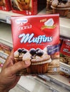 KLANG, MALAYSIA - 12 September 2020 : Hand hold a boxed of Dr Oetker Muffins Blueberry flour for sell in the supermarket.