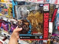 KLANG, MALAYSIA - 29 September 2020 : Hand hold a packed of TRANSFORMERS MEGATRON Toy in the supermarket toy store.