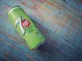 Klang, Malaysia - 18 September 2020 : New 7 Up Free soft drink can on the blue wooden background.