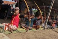 Klaten, Indonesia, august 15, 2023. male and female participants, dressed in Javanese custom pulled his bow by squinting to