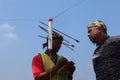 Klaten, Indonesia, august 15, 2023. male and female participants, dressed in Javanese custom pulled his bow by squinting to