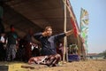 Klaten, Indonesia, august 15, 2023. male and female participants, dressed in Javanese custom pulled his bow by squinting to