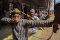 Klaten, Indonesia, august 15, 2023. male and female participants, dressed in Javanese custom pulled his bow by squinting to