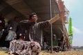 Klaten, Indonesia, august 15, 2023. male and female participants, dressed in Javanese custom pulled his bow by squinting to