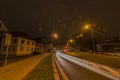 Klatovy new street with cars in autumn night with orange sky