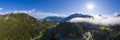 Klause valley panorama with sun, highline 179 and morning dust fog