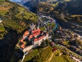 Klausen, Italy - Aerial view of the SÃ¤ben Abbey Monastero di Sabiona with Chiusa Klausen comune in South Tyrol Dolomites