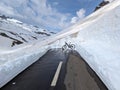 Klausenpass, Uri, Switzerland, bike at end of road in snow Royalty Free Stock Photo