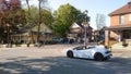 Kleinburg, Ontario, Canada - 06 02 2019: Summer evening on Islington Avenue with white Lamborghini Huracan EVO Spyder